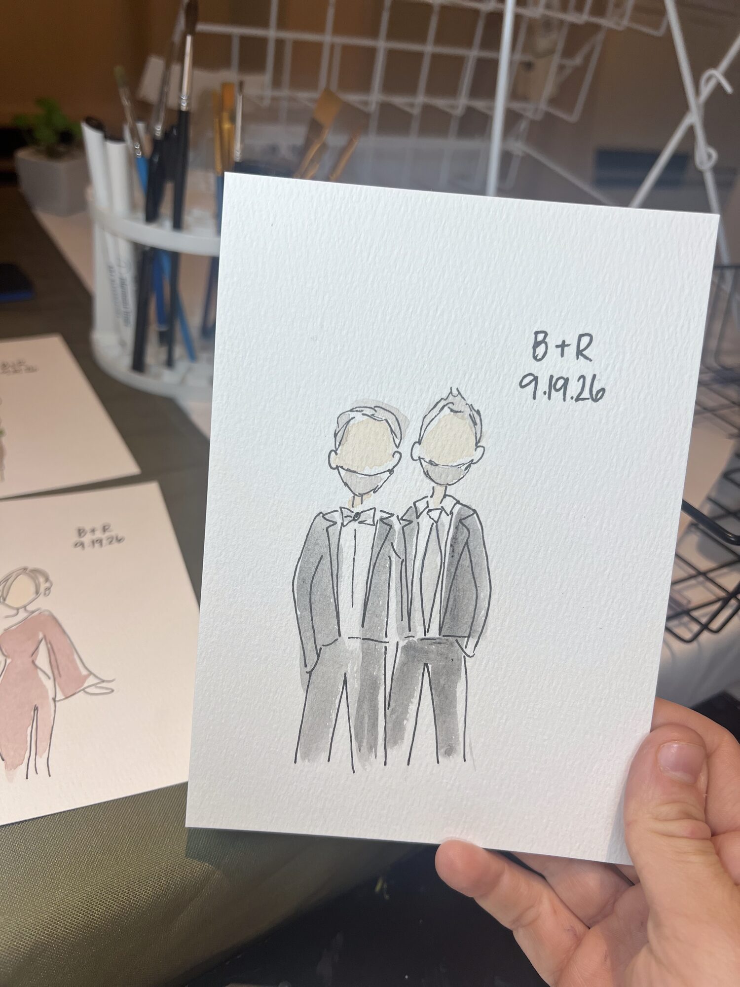 Mini portrait of two grooms in gray suits